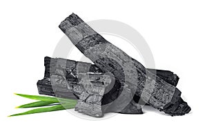 wood natural charcoal with pandan leaf isolate on white background