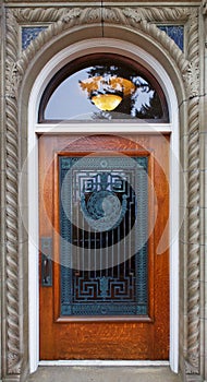 Wood and ornate grill door