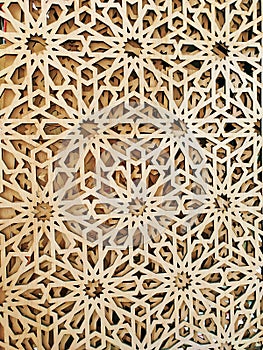 Wood partition room with ornamental pattern. Jaali