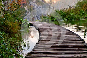 Wood path in the Plitvice national park in autumn