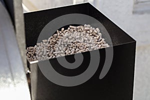 Wood pellets in a smoker pellet box for barbecue