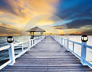 Wood piers and sea scene with dusky sky use for natural background ,backdrop