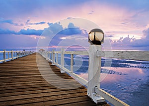 Wood piers and sea scene with dusky sky use for natural background ,backdrop photo