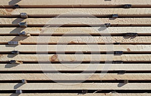 Wood plank stack construction material