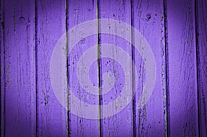Wood planks frame, old purple paint peeling off background texture
