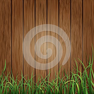 Wood planks and green grass background