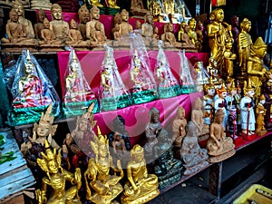 Wood products carved in the form of Buddha and deities