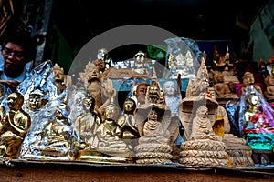 Wood products carved in the form of Buddha and deities