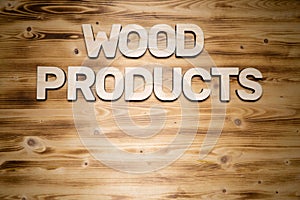 WOOD PRODUCTS words made of wooden block letters on wooden board
