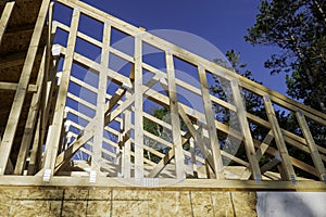 Wood rafters at a new home construction building site