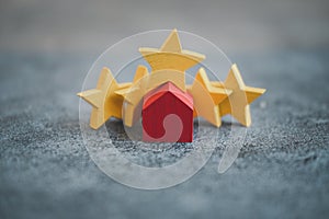 Wood red home with yellow star rating feedback and press level excellent five rank for giving best score