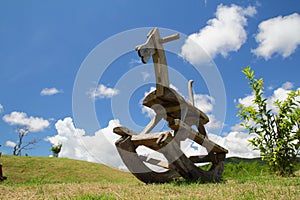 wood rocking horse on hill