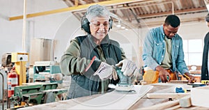 Wood, sander and woman in workshop with tools for furniture, production or carpenter in small business. Construction