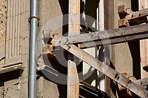 Wood scaffolding joint and bolted connection closeup. textured wood beams