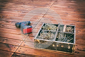 Wooden box with screws