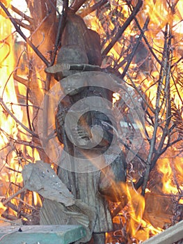 Wood Sculpture in fire photo
