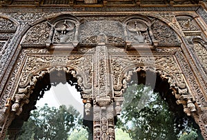 Wood sculptured in front of the palace