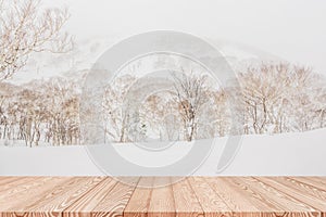 Wood shelf table with blurred background of mountain and trees