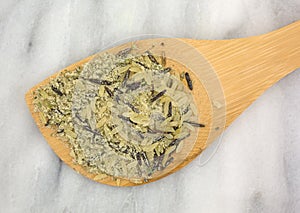 Wood spoon with long grain wild rice mix