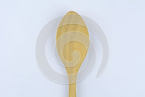 Wood spoon on white