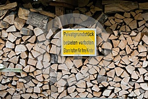 Wood stack, with forbitten to enter sign to prevent robbing of t