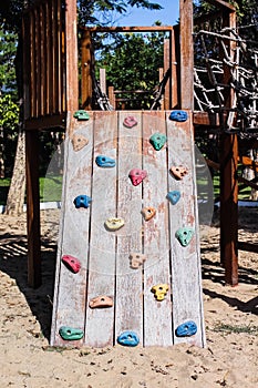 Wood stairs with toys rock climbing outdoor playground  , no children on background