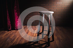 Wood stool on a stage