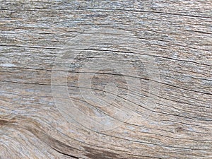 wood surface with an antique knot like decoration, in light shades