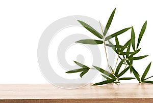 Wood table and bamboo isolated on white background with clipping path