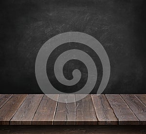 Wood table with blackboard background