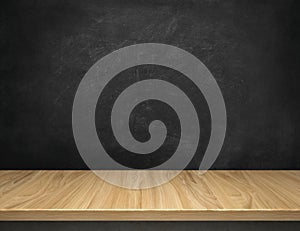 Wood table with blackboard background