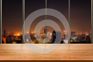 Wood table in city center modern office background