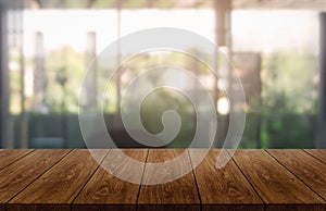 Wood table in city center modern office background photo