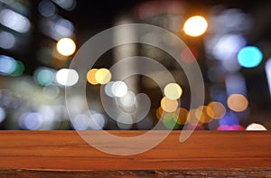 Wood table in front of cafe light