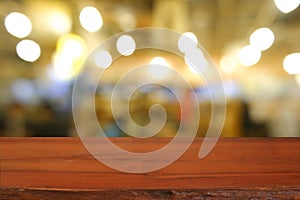 Wood table in front of cafe light