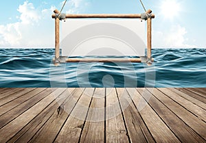 Wood table and hanging sign on blue sea background