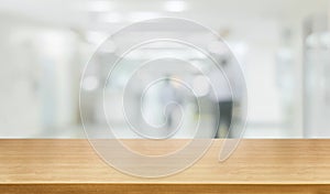 Wood table in modern hospital building interior