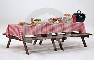 Wood table and red napkin cover for outdoor party