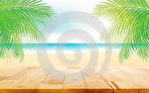 Wood table top on beautiful summer beach background