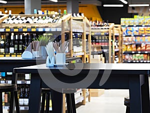 Wood table top with blur in coffee shop background