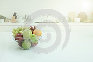 Wood table top on blur kitchen window background, panoramic banner