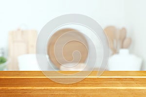 Wood table top on blur kitchen window background, panoramic banner