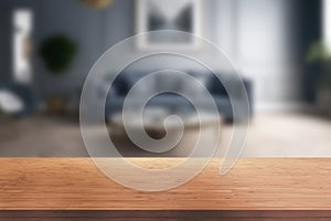 Wood table top on blur living room background