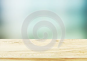 Wood table top on blurred abstract background - can be used for
