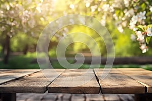 Wood table top with lights bokeh , Empty wooden for montage or display your products covered with garden blurred bokeh background.