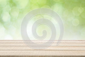 Wood table top panel on green background