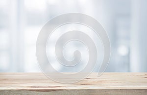 Wood table top on white abstract background form office building