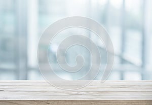 Wood table top on white abstract background form office building