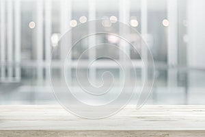 Wood table top on white abstract background form office building