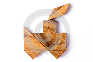 Wood tangram puzzle in train shape on white background